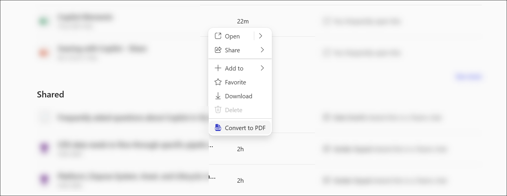 A context menu in the Microsoft 365 Copilot app showing Convert to PDF as an option.